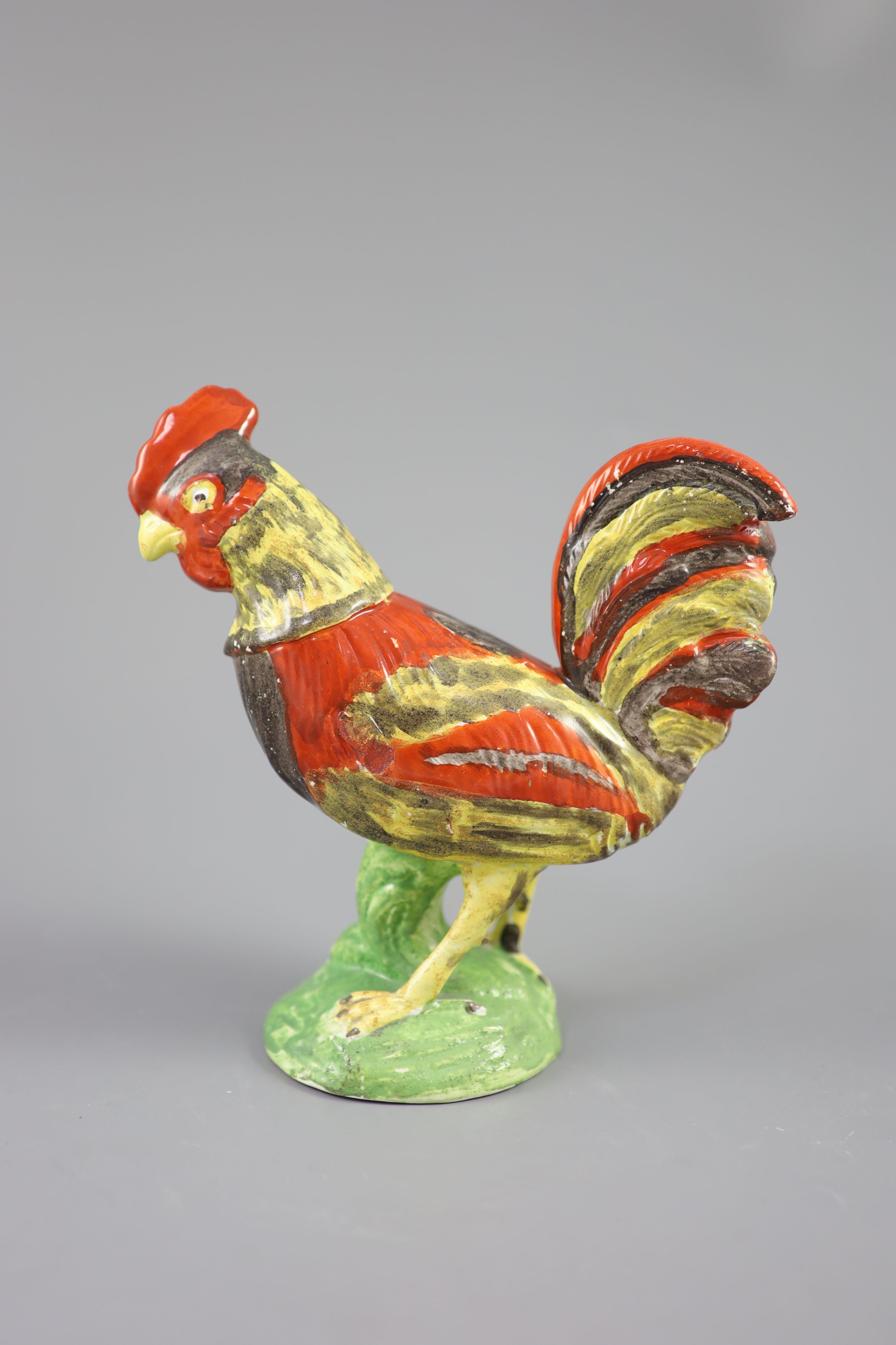 A Staffordshire pearlware figure of a cockerel, c.1820, 19cm high